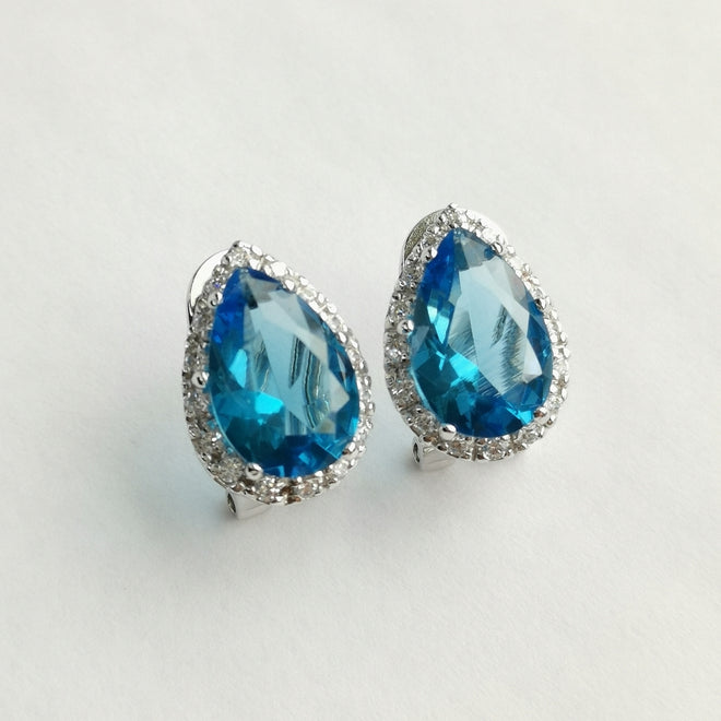 Pear Cut Swiss Blue Topaz and White Sapphire Halo Earrings