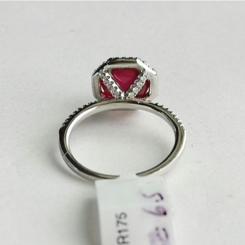 Vintage Cabochon Ruby Ring with White Sapphire Halo