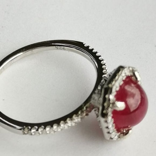 Vintage Cabochon Ruby Ring with White Sapphire Halo