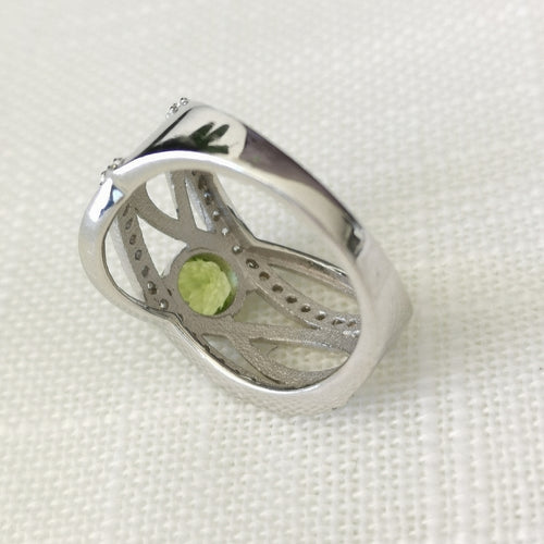 Apple Green Peridot White Topaz Waves Cocktail Ring In Sterling Silver