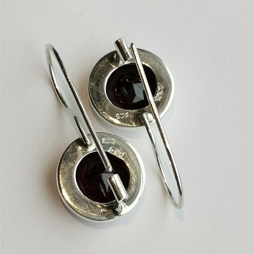 Round Cut Garnet Drop Earrings in Sterling Silver