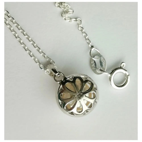 White cultured pearl pendant necklace with cz halo