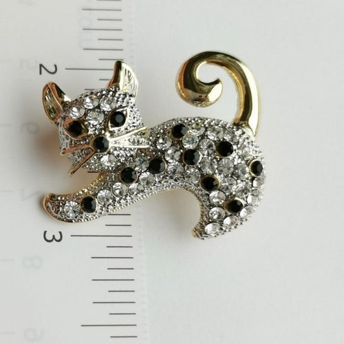 Playful Cat Brooch with Clear and Black Crystals in Gold Tone