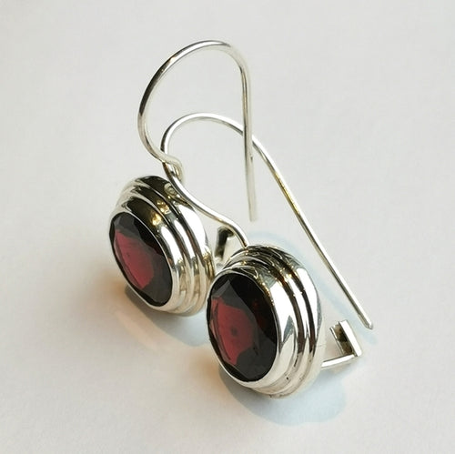 Round Cut Garnet Drop Earrings in Sterling Silver