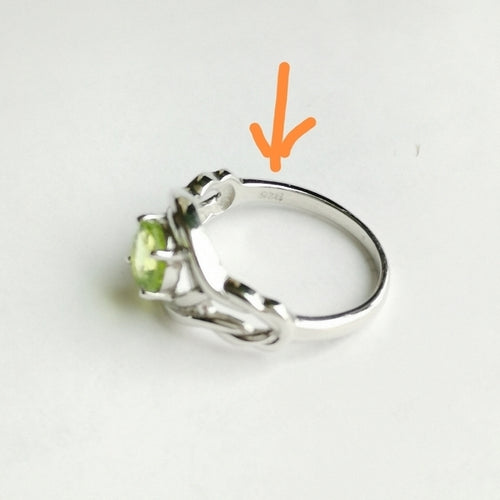 Peridot Ring in Sterling Silver with Eternity Knot size 7