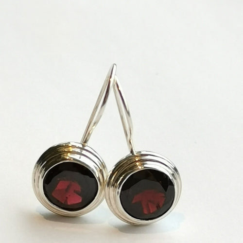 Round Cut Garnet Drop Earrings in Sterling Silver